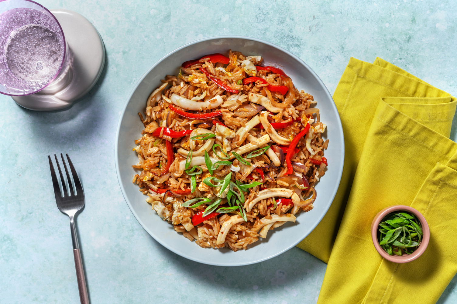 Arroz chaufa con calamar gigante salteado