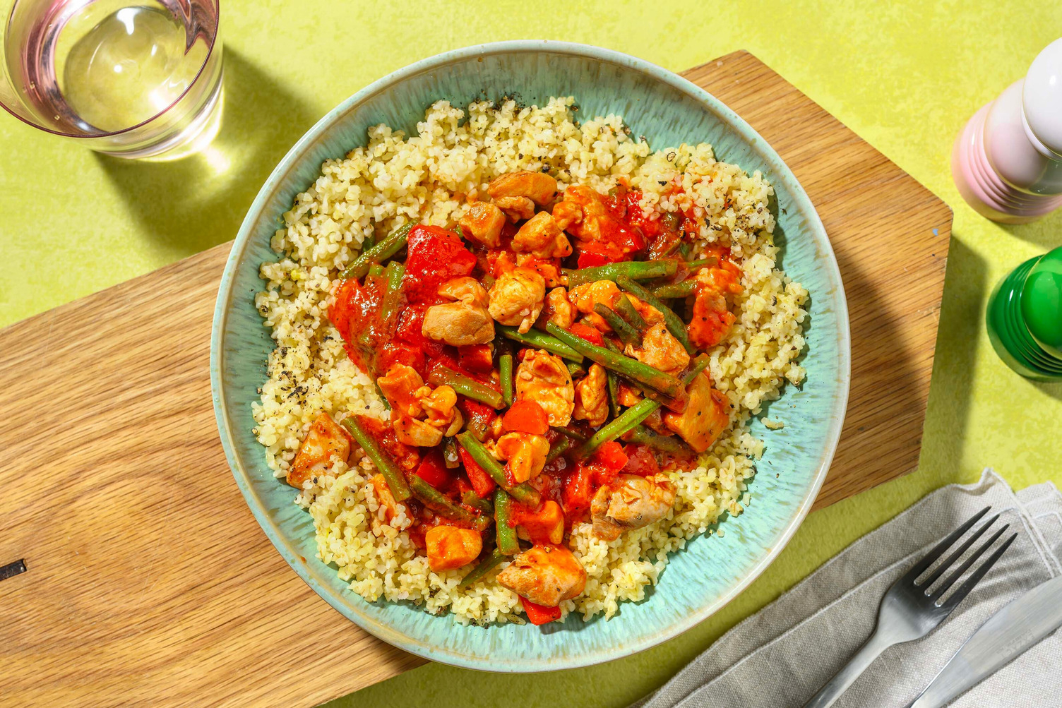 Spiced Tomato Chicken on Zesty Bulgur