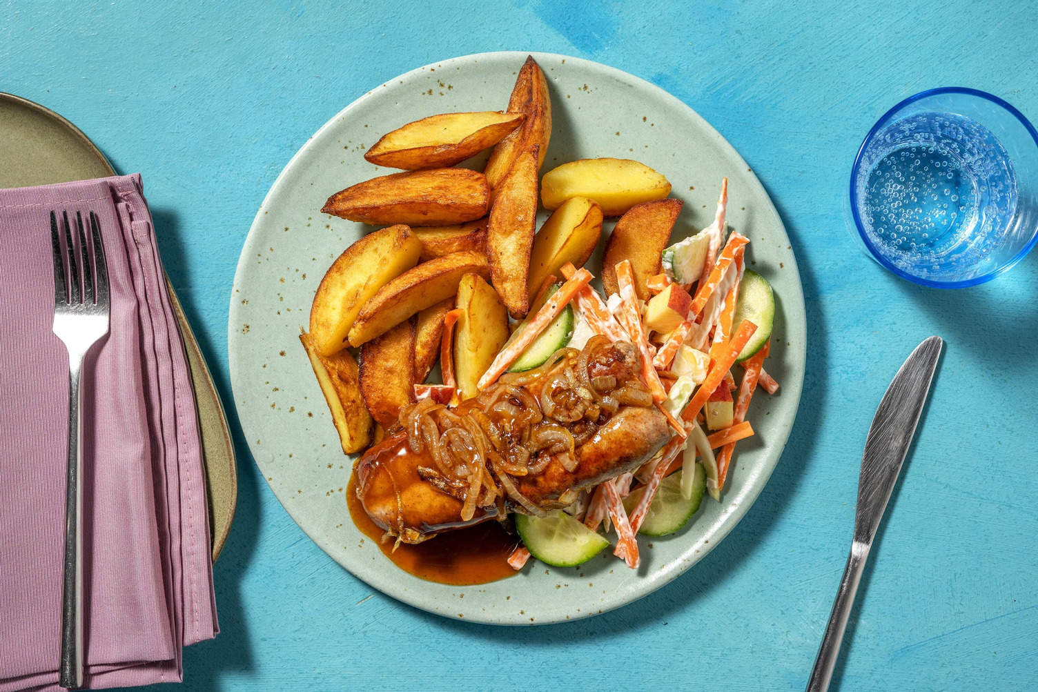 Saucisse de porc en sauce au curry