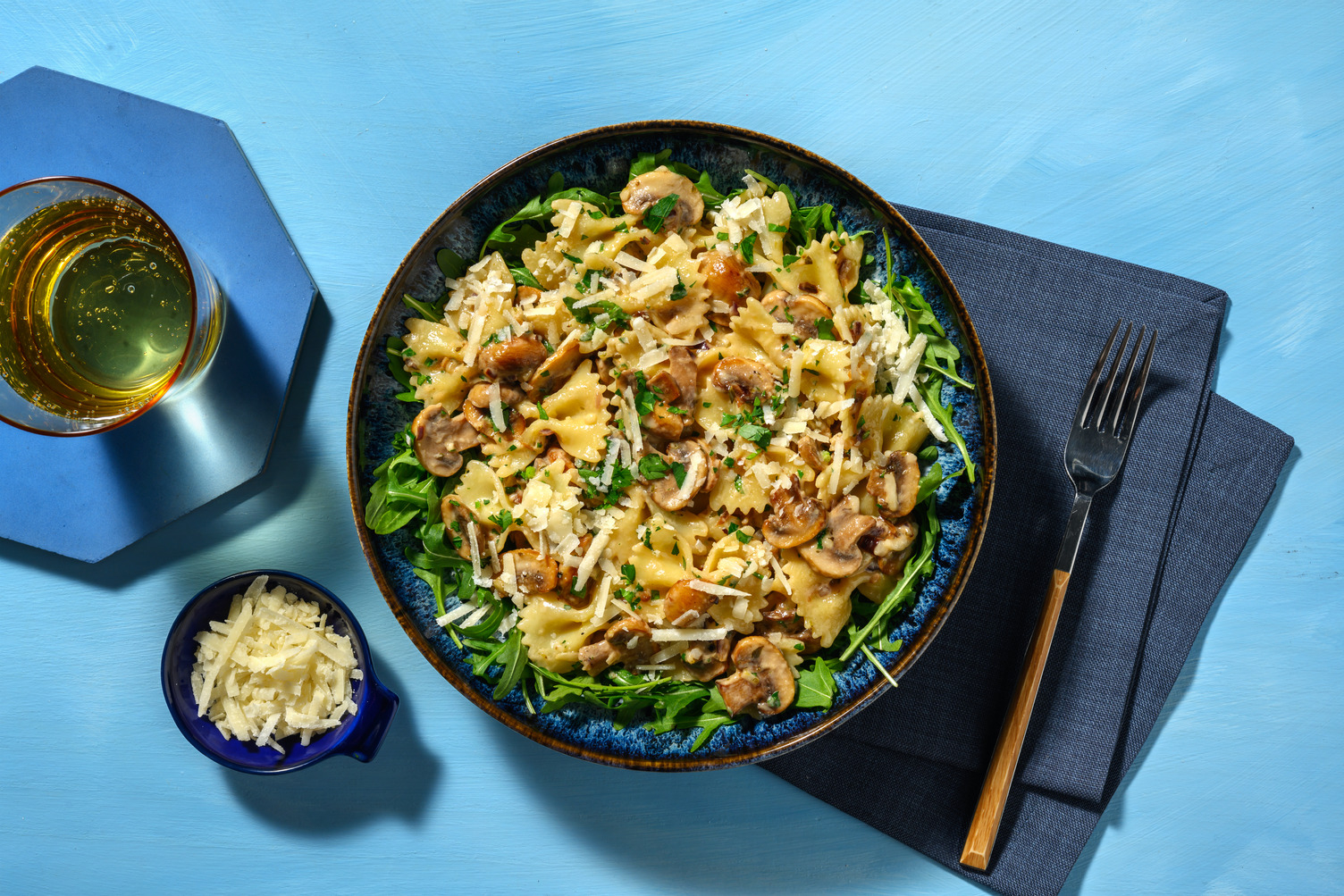 Farfalle con fricasé de champiñones