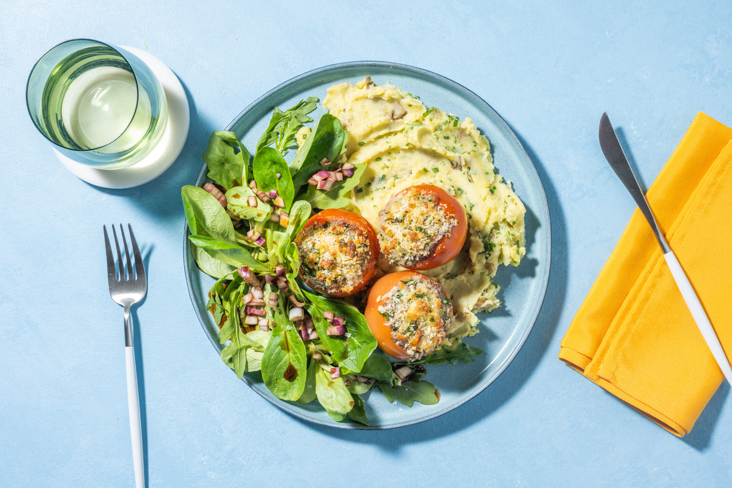 Gevulde tomaten met cheesy pankotopping