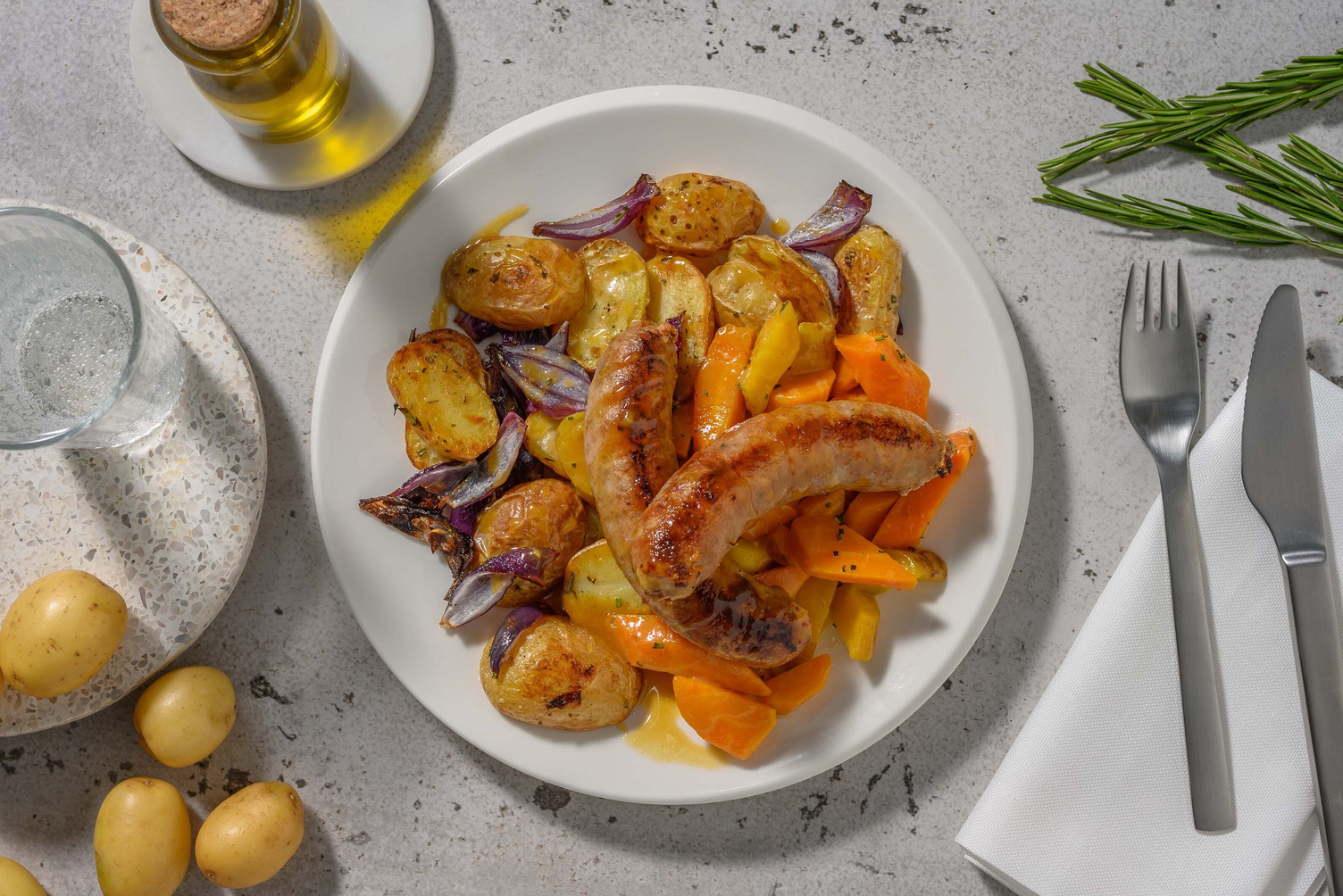 Saucisses de porc nappées d'une sauce au miel & moutarde