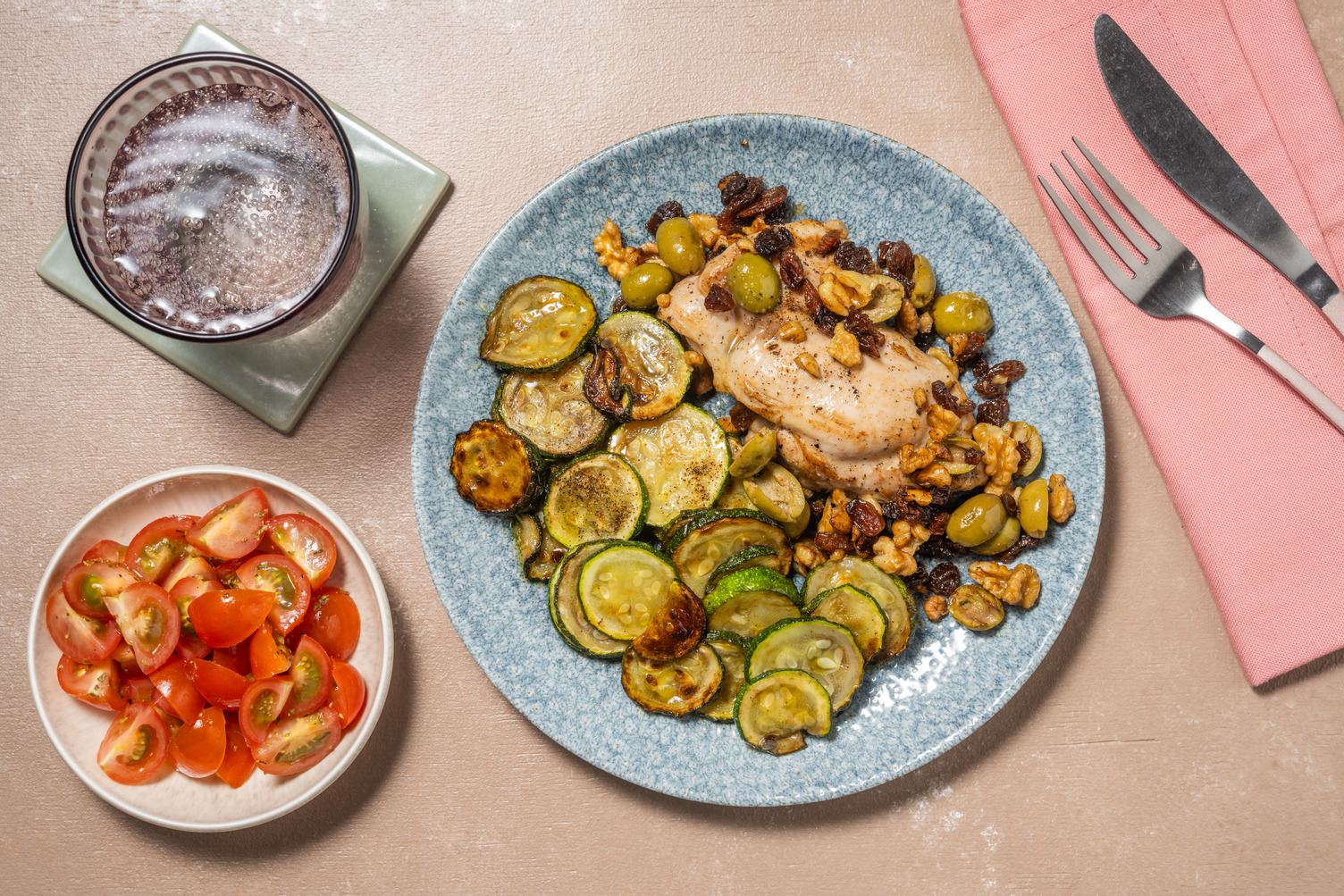 Pollo alle olive, noci e uvetta