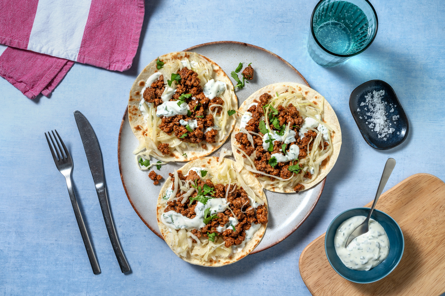Tostadas speziate di maiale e salsa yogurt