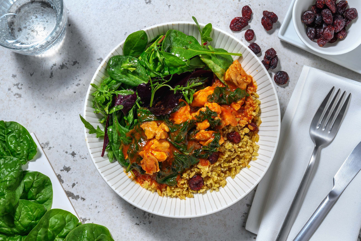 Harissa Chicken on Cranberry Bulgur