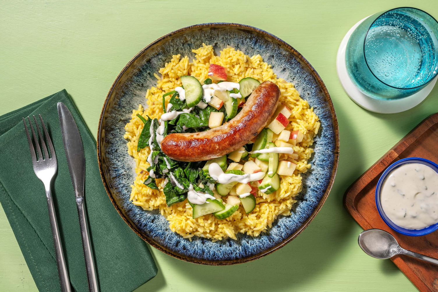 Bowl met rundermerguez en vadouvan-knoflookrijst