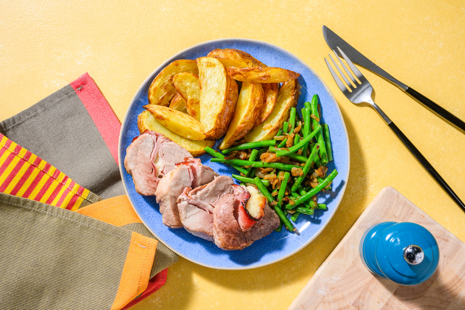 Gevulde varkenshaas met ham en kaas