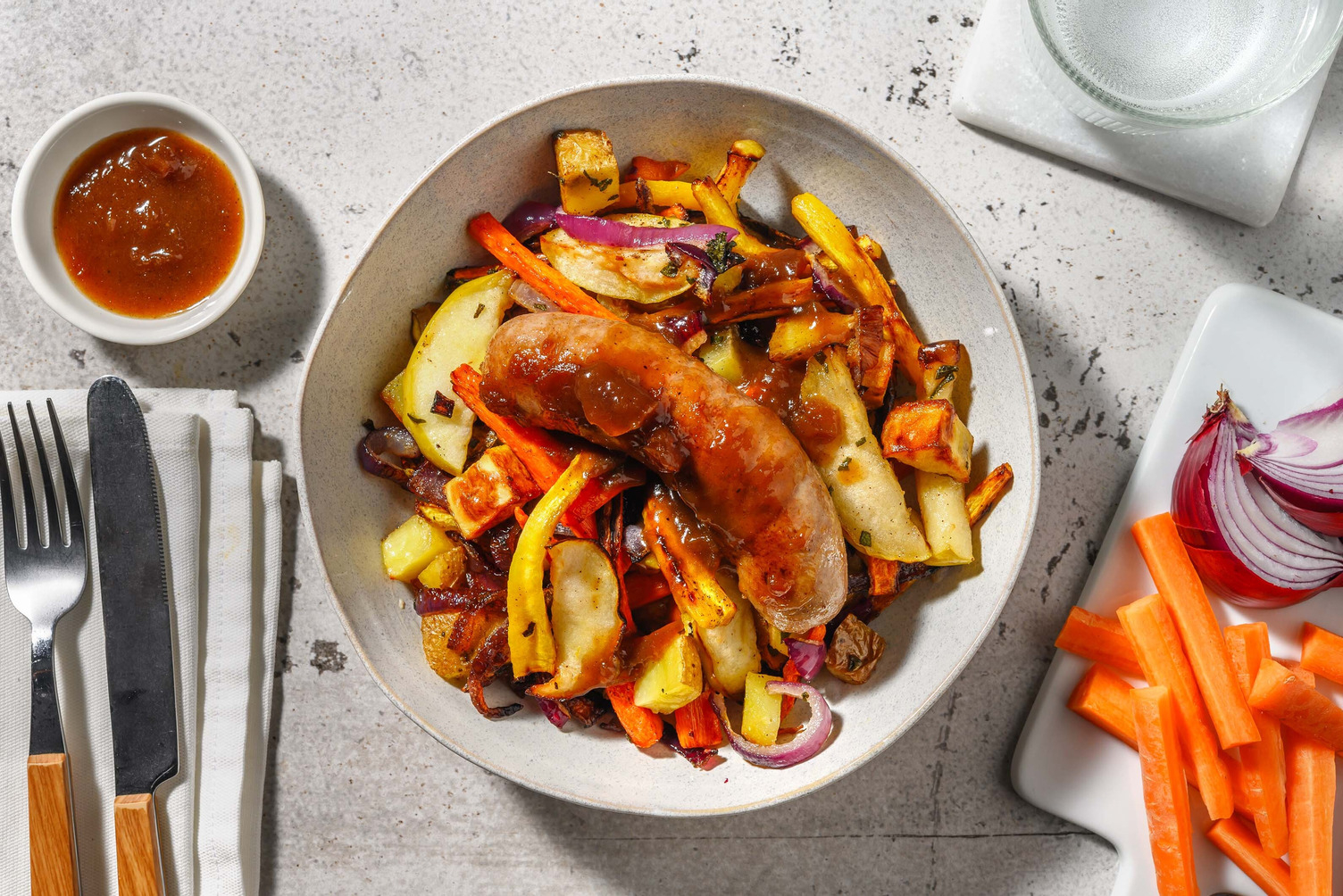 Citroen en tijm varkensworst van Brandt & Levie met patatjes