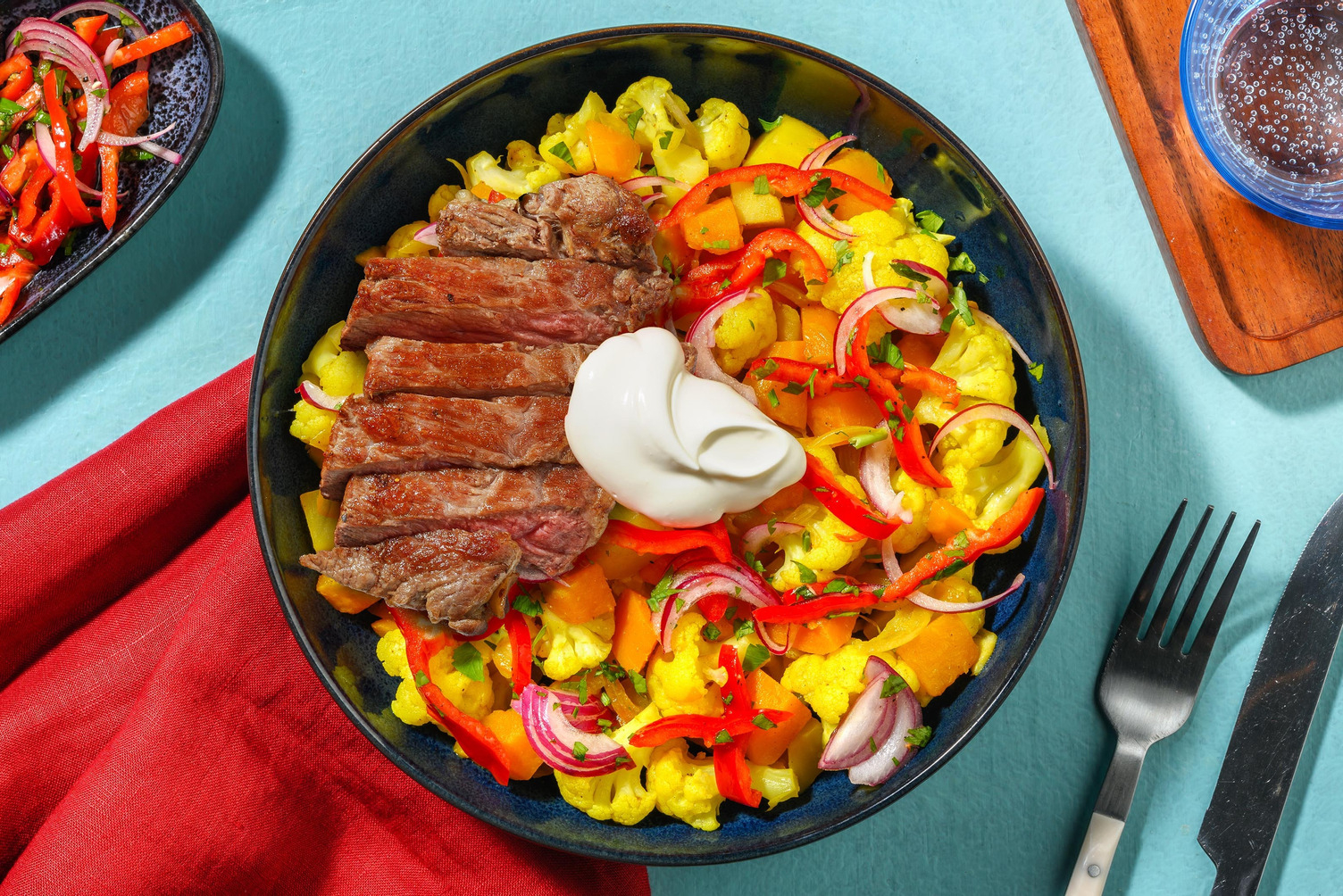 Bunte Kartoffelpfanne mit extra Rindersteak