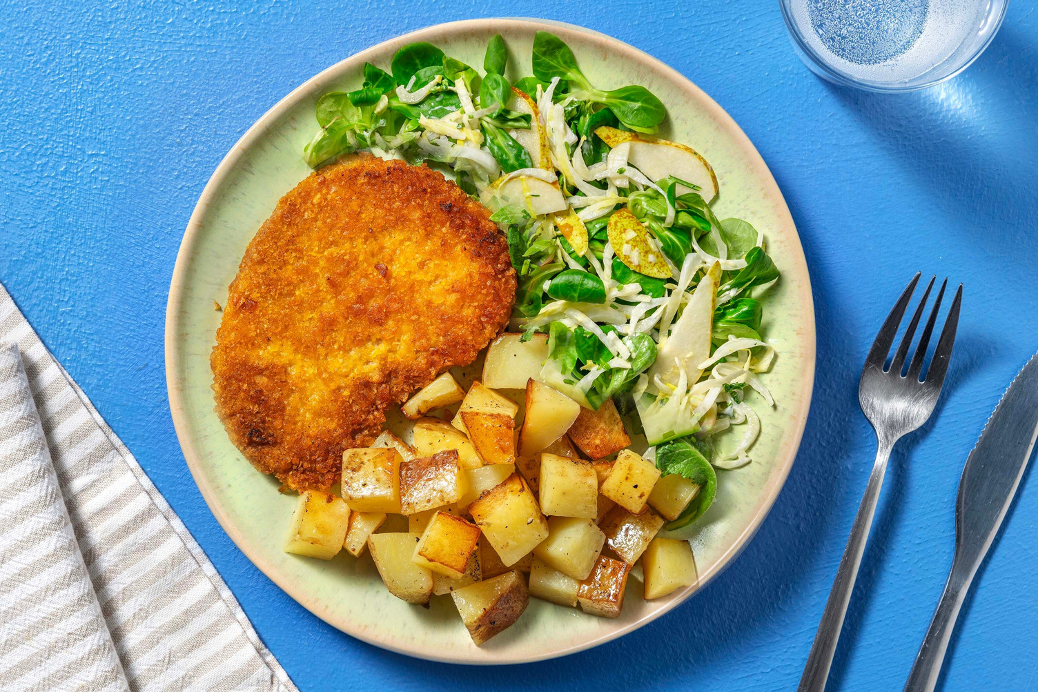 Escalope végétarienne au fromage et pommes de terre sautées