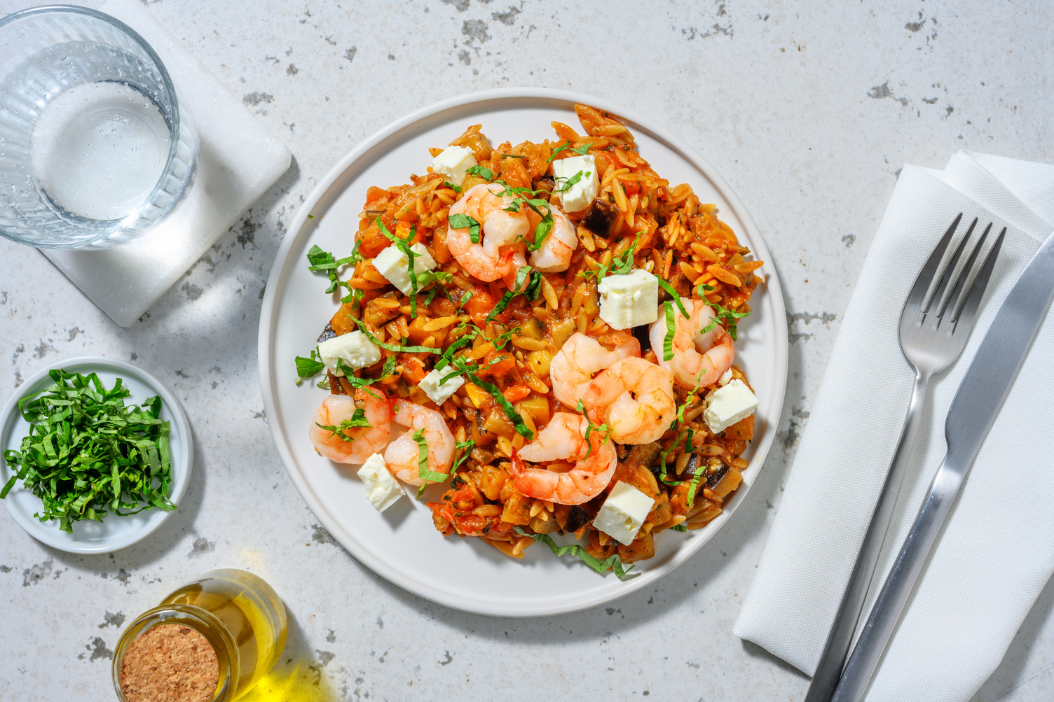 Crevettes à l'ail & feta sur orzotto à l'aubergine