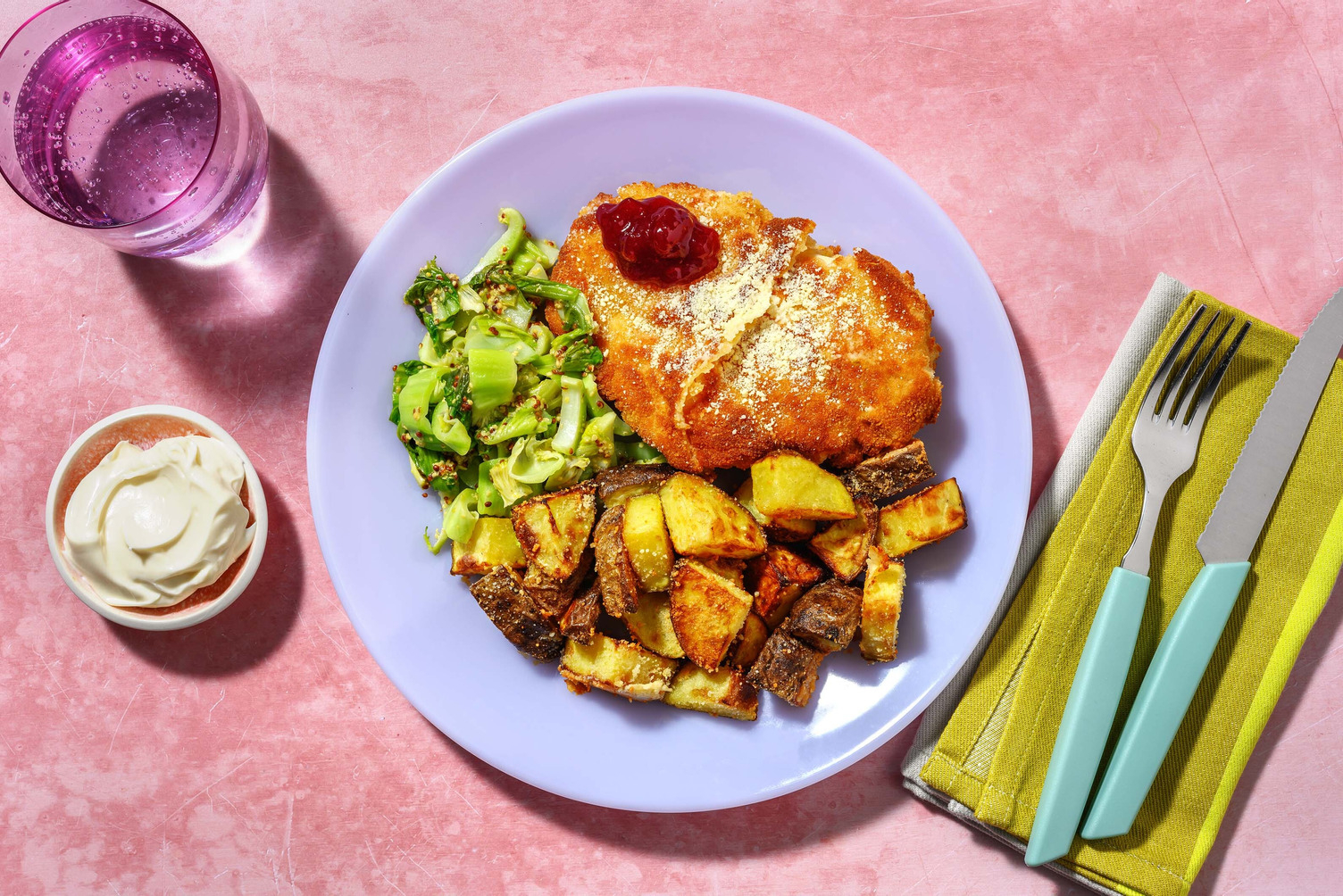 Alpine Inspired Chicken Schnitzel and Cheesy Bacon Roasties