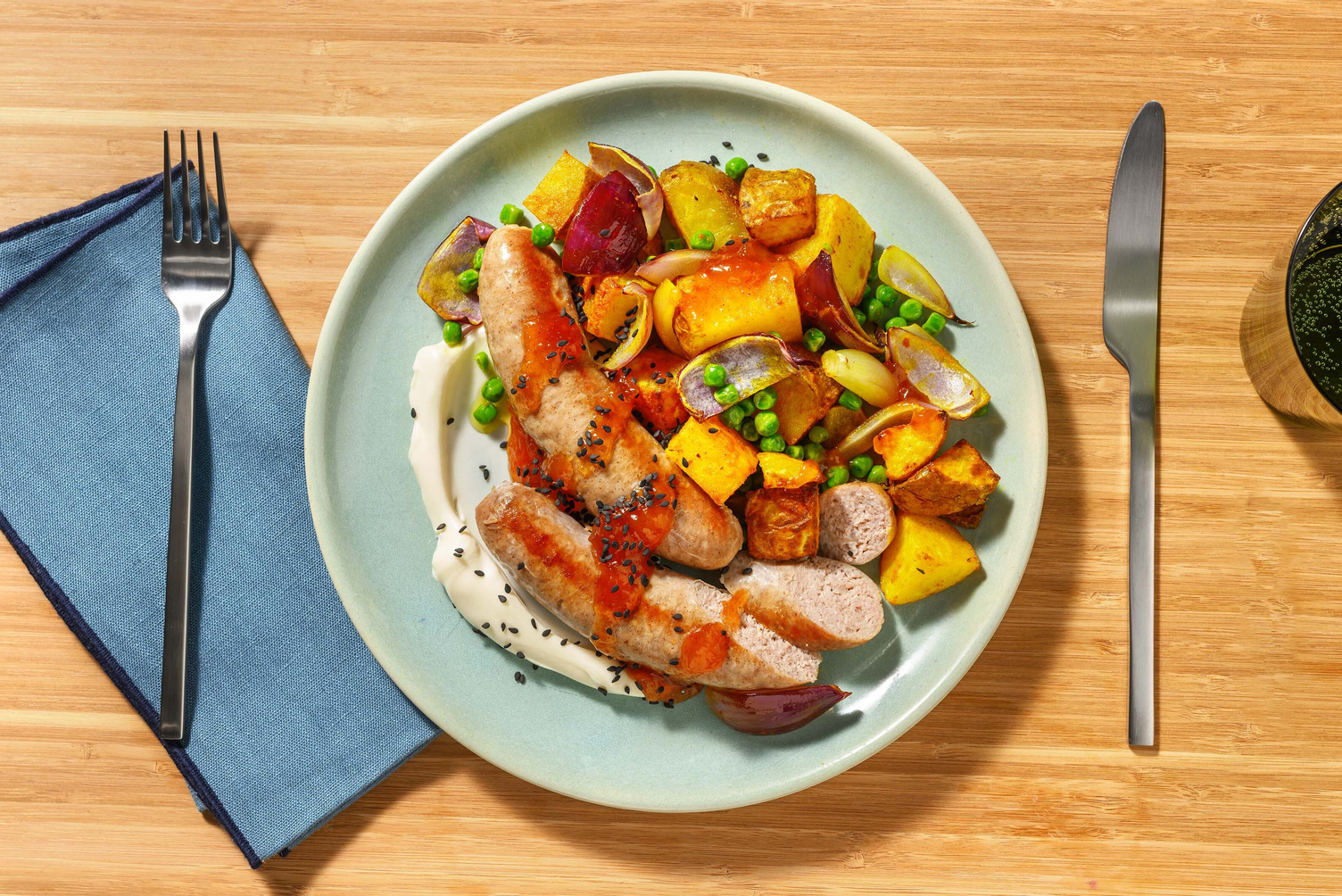 Curried Roasted Veg and Double Sausage Traybake