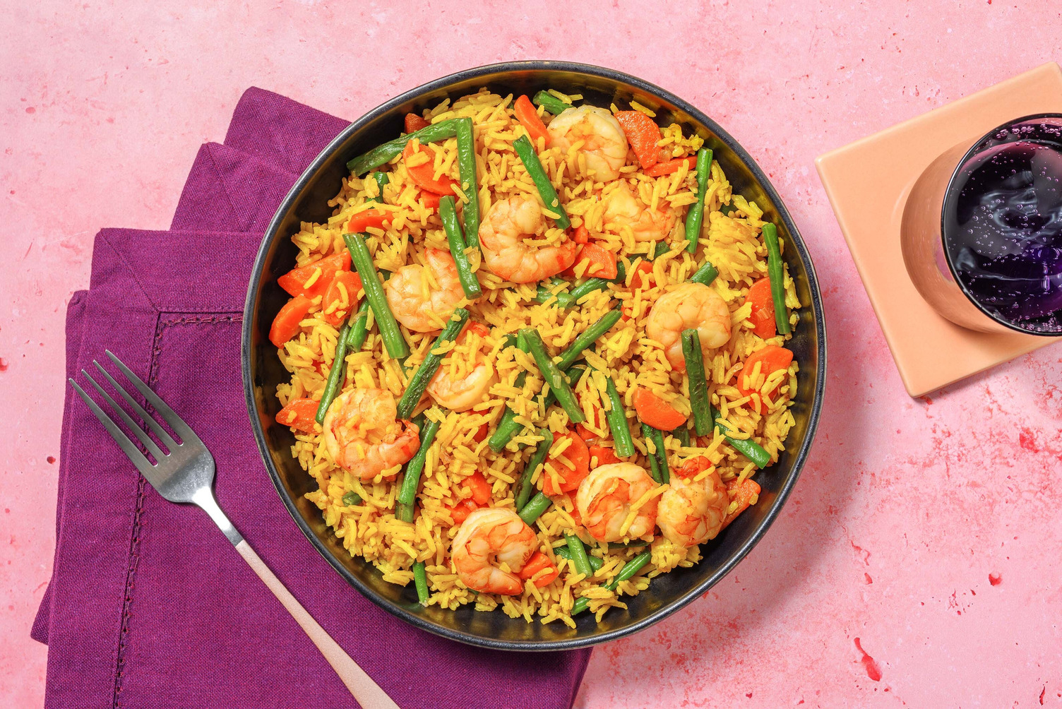 Stir-fry di riso alla curcuma e mazzancolle