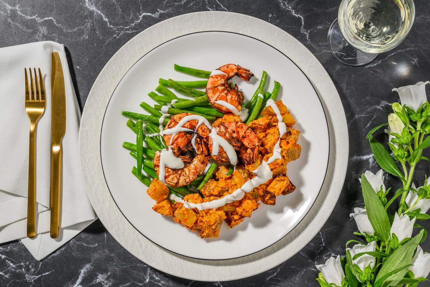 Code di gamberi e patate alla galiziana