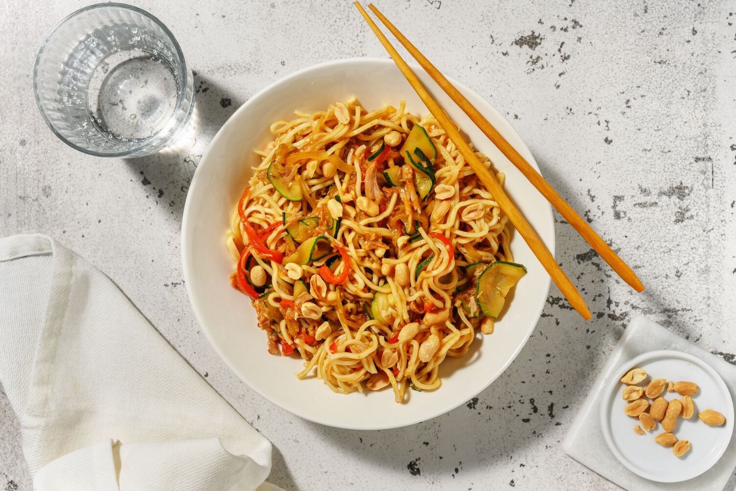 Wok de nouilles au porc effiloché teriyaki