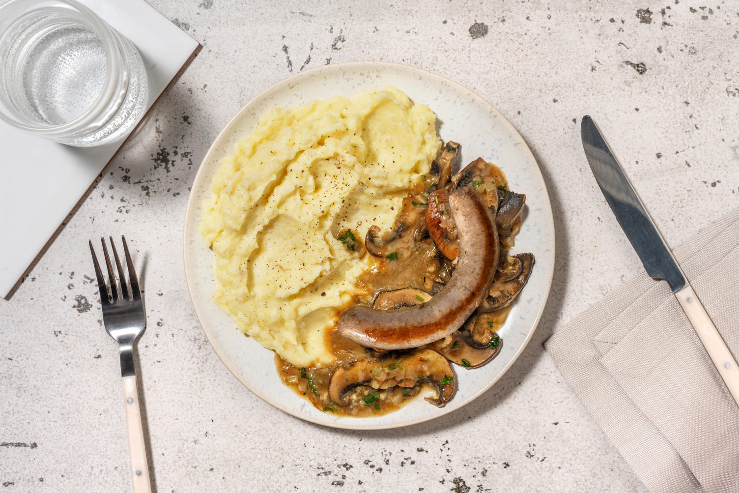 Saucisse de Toulouse & purée de céleri