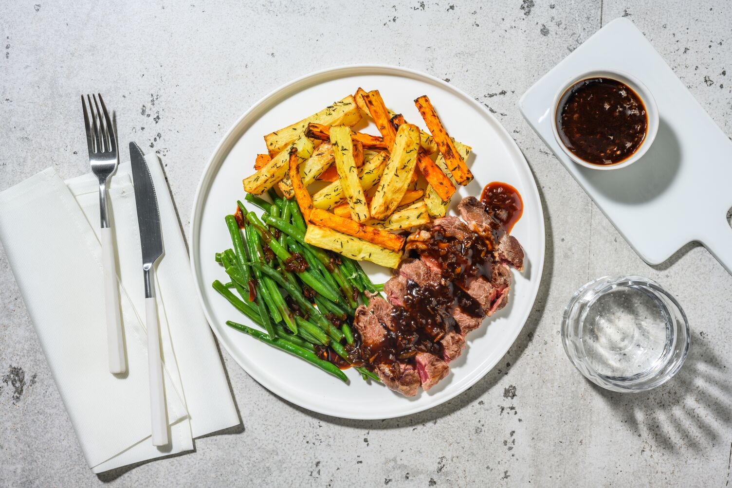 Bœuf sauce échalote & frites de légumes