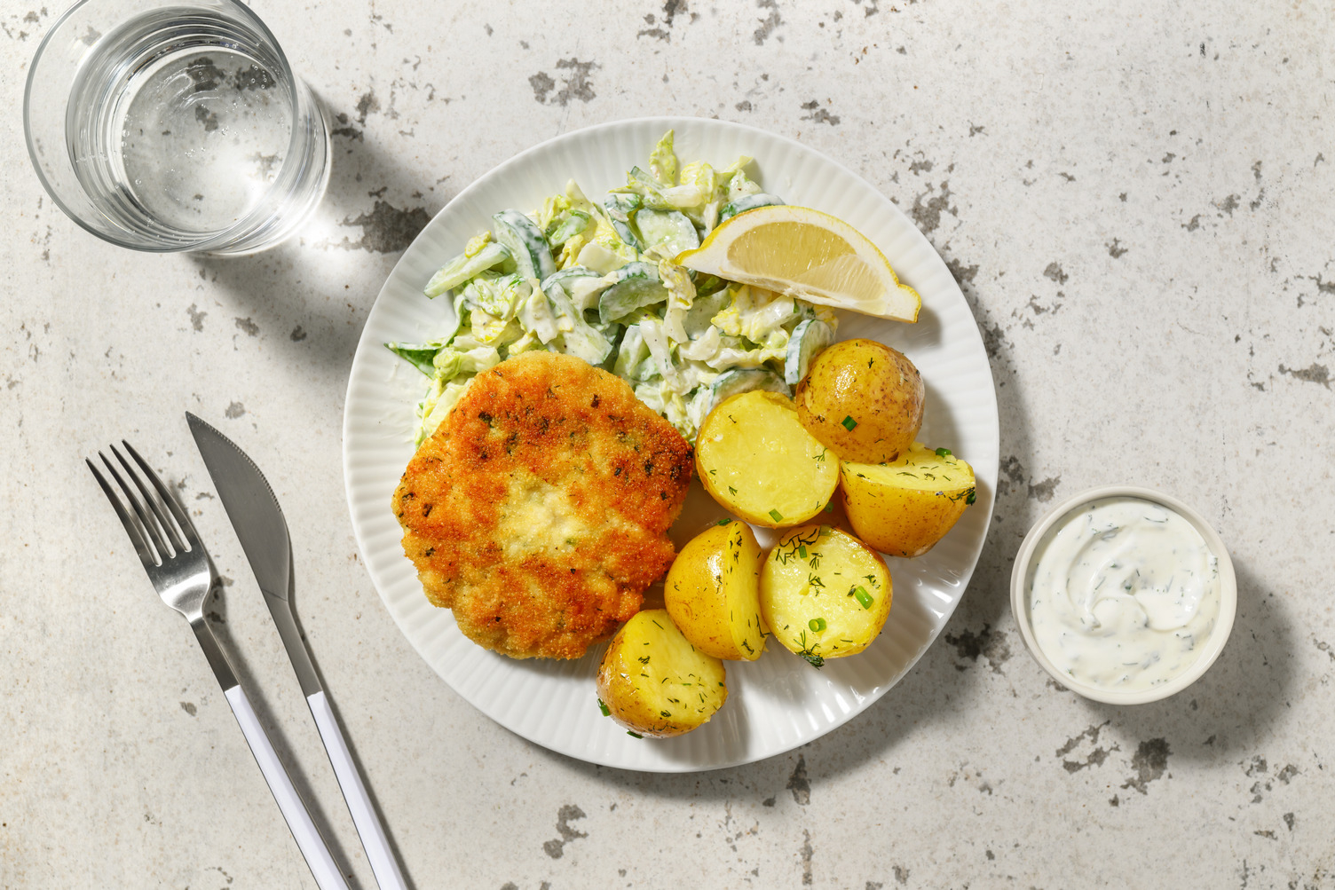 Würzige doppelte Fischboulette in Kräuterpanade
