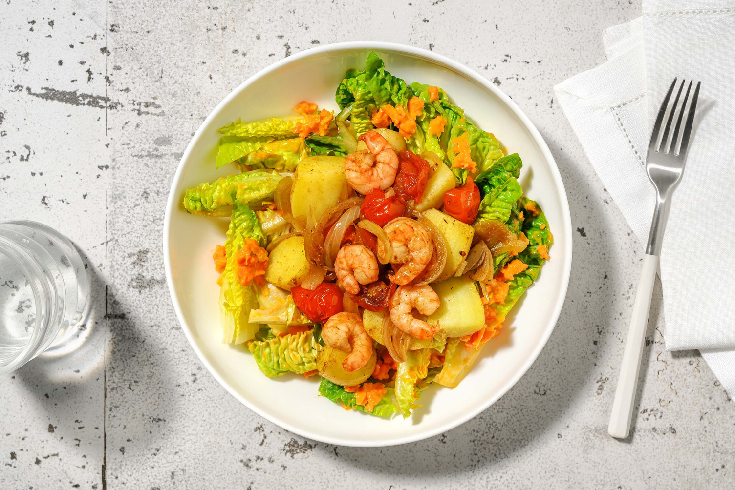 Kreolische Kartoffel-Bowl mit Garnelen