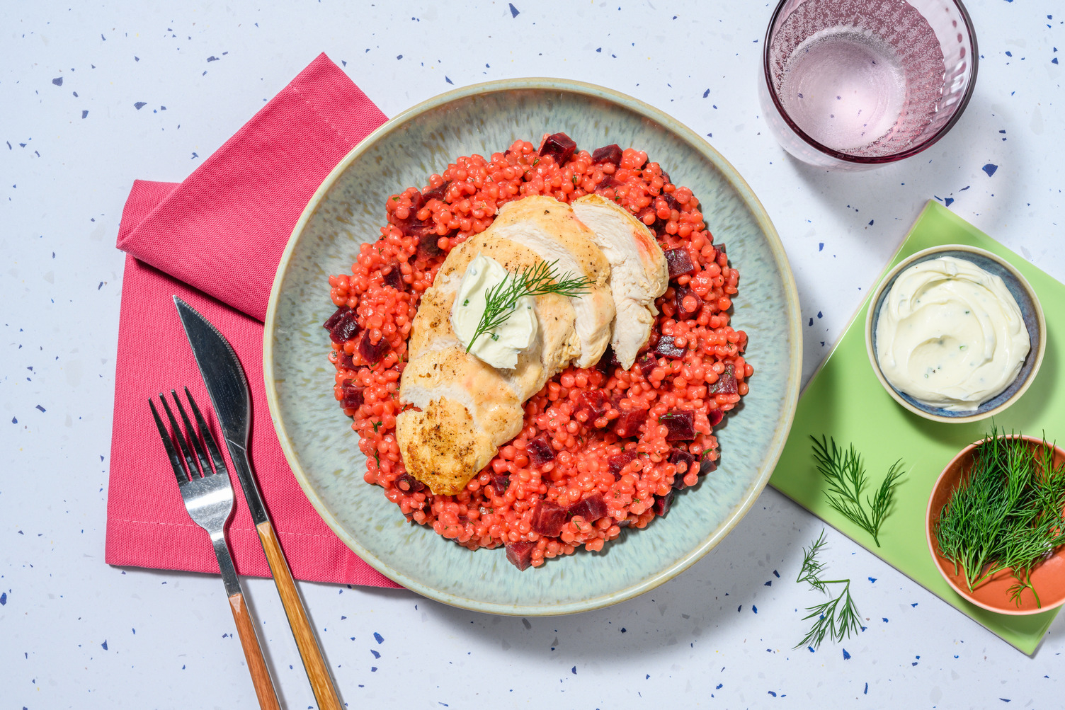 Bio-Schweinefilet auf pinkem Perlcouscous-Risotto