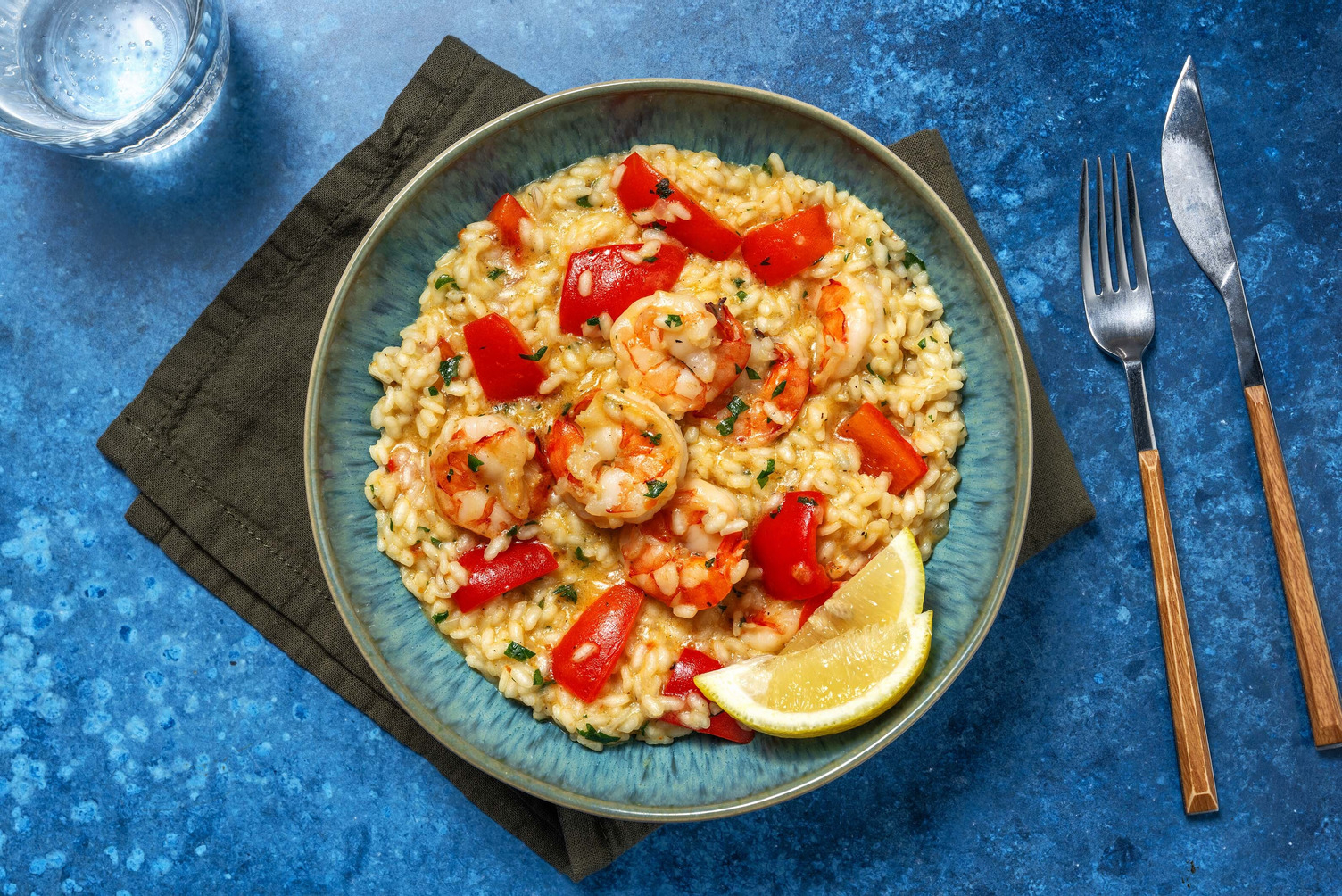 Riesengarnelen mit Zitrone auf cremigem Risotto