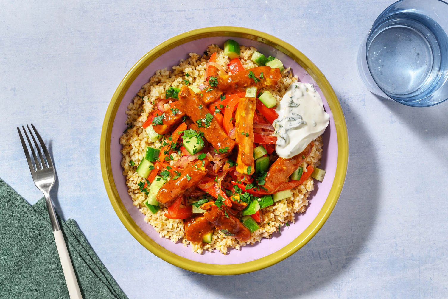 Griechische Schweinefiletstreifen auf Bulgur