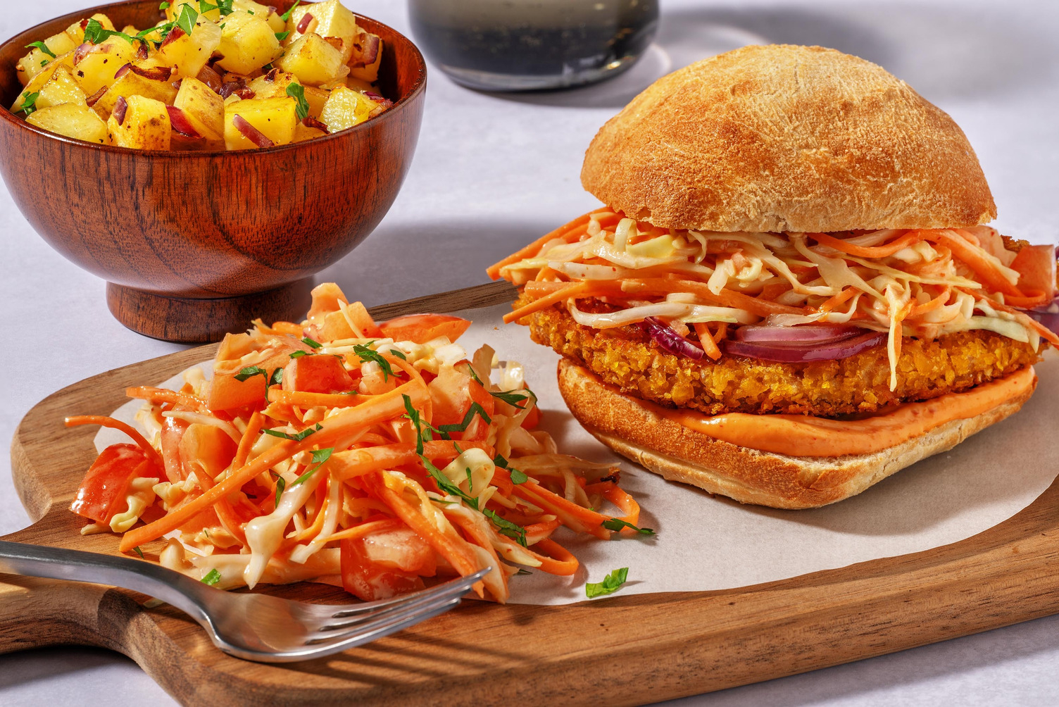 Sandwich d'escalope panée au fromage et pommes de terre persillées