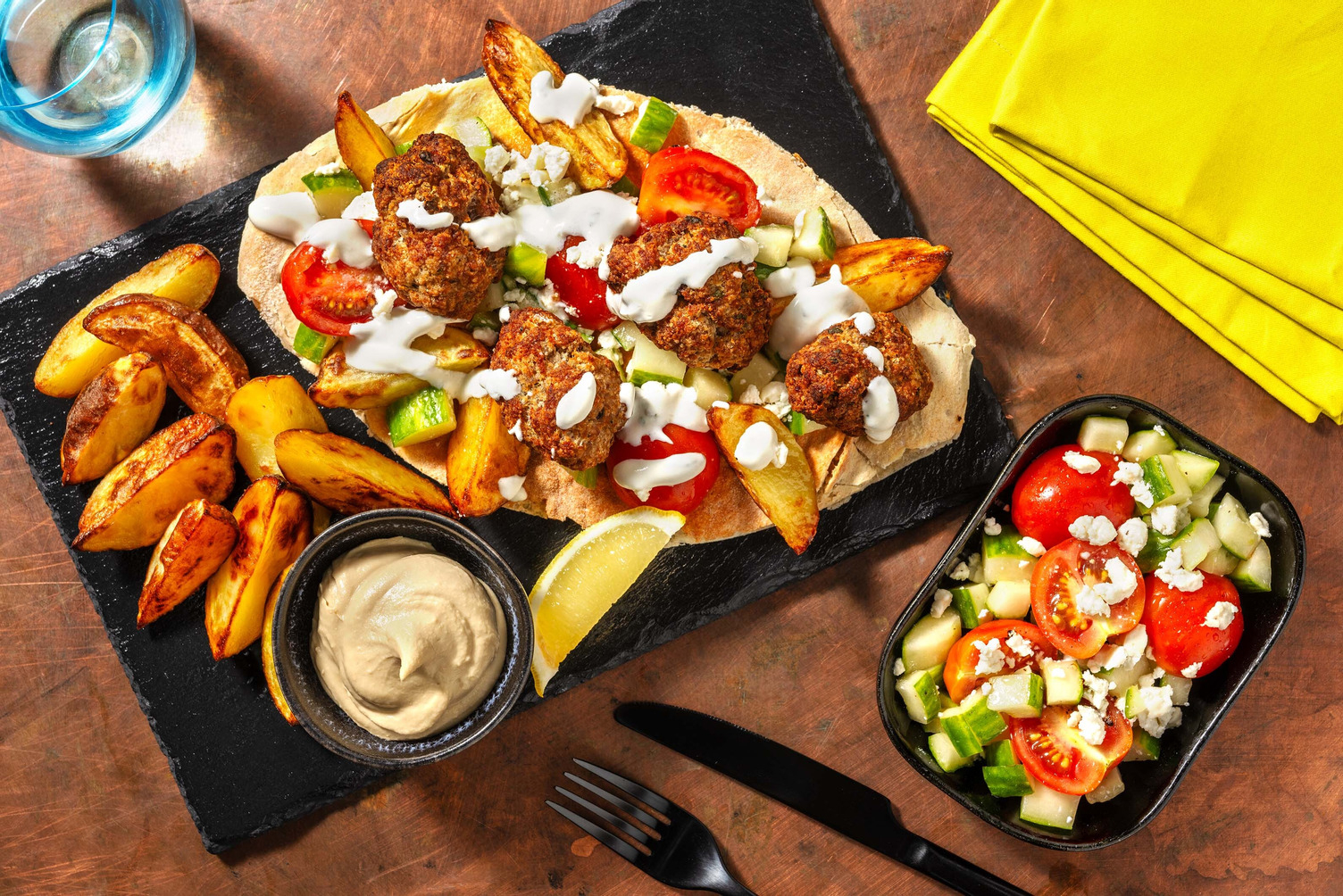 Greek Inspired Lamb Steak, Halloumi & Houmous Gyros and Chips
