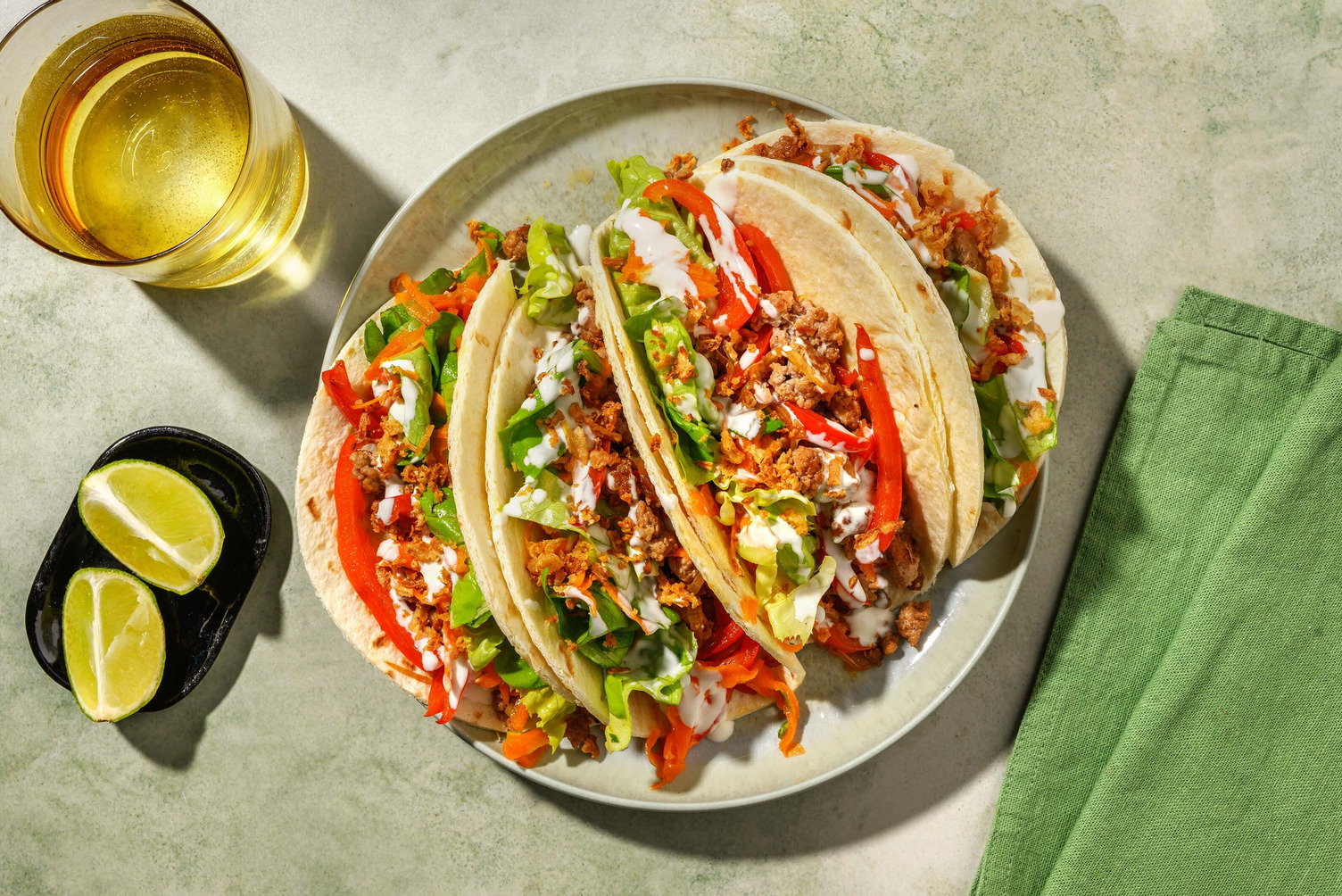 Fusion taco's met varkensgehakt en honing-gemberdressing