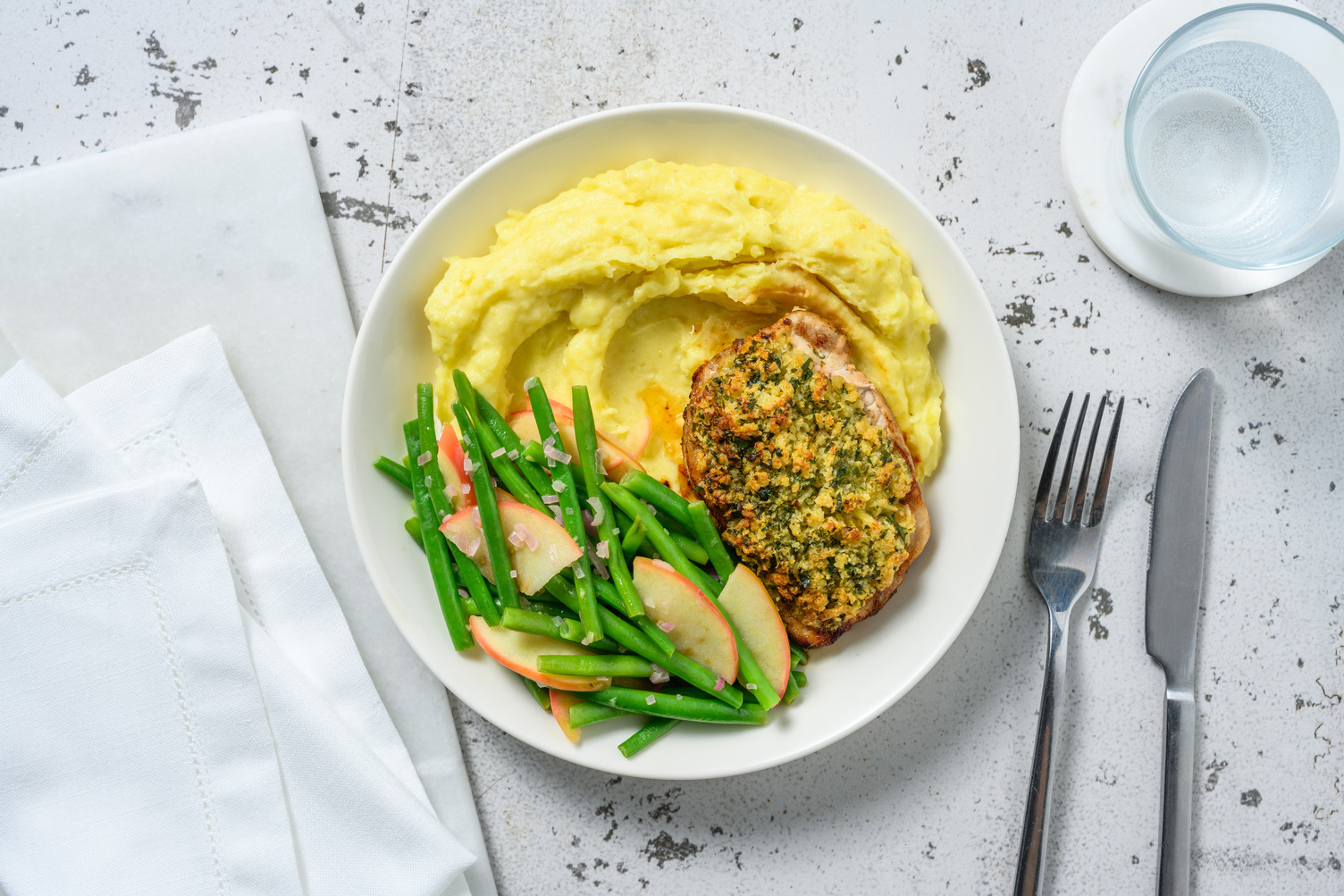 Doppelt Schweinelachssteak mit Kräuterkruste