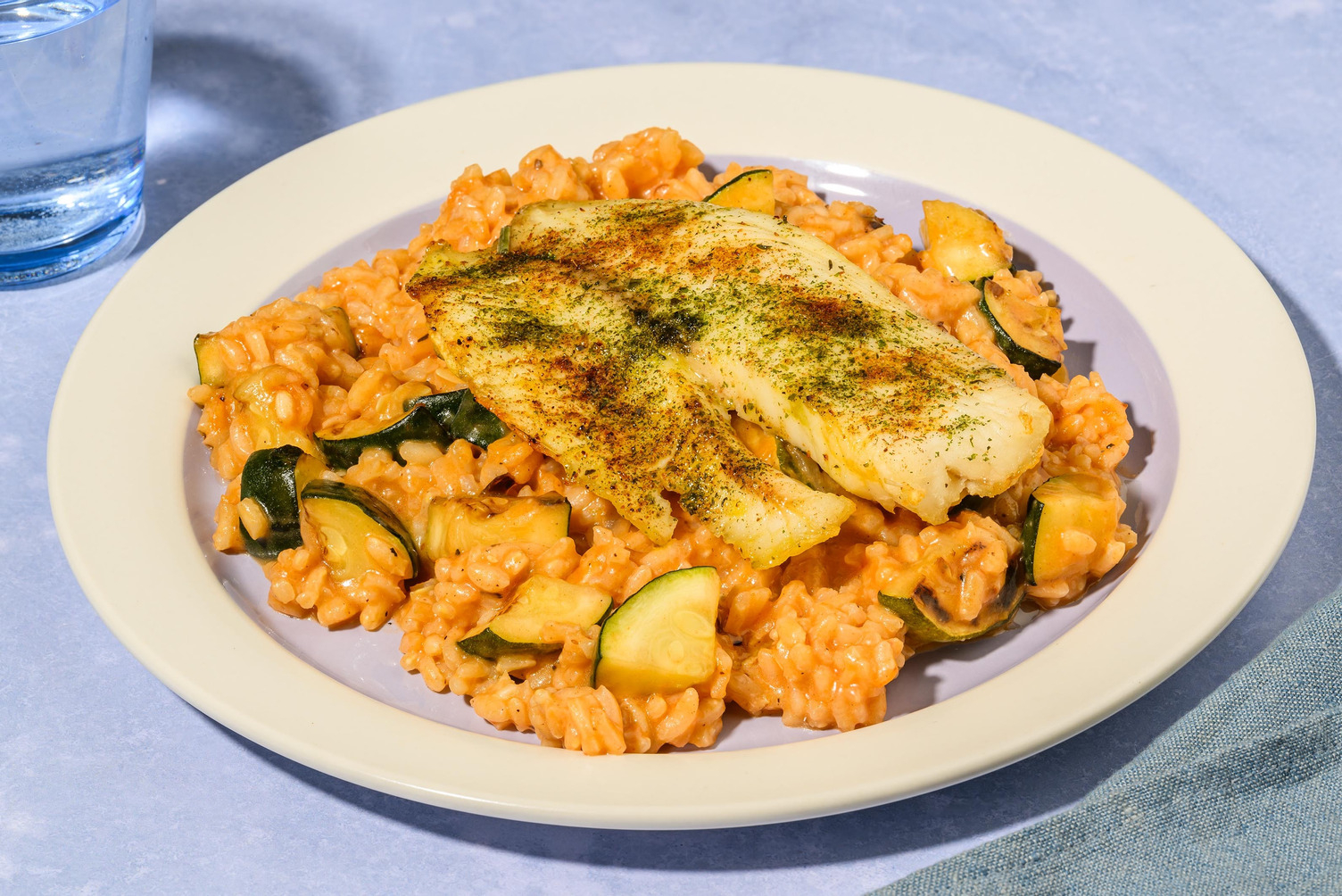 Oven-Baked Spiced Basa on Harissa Risotto
