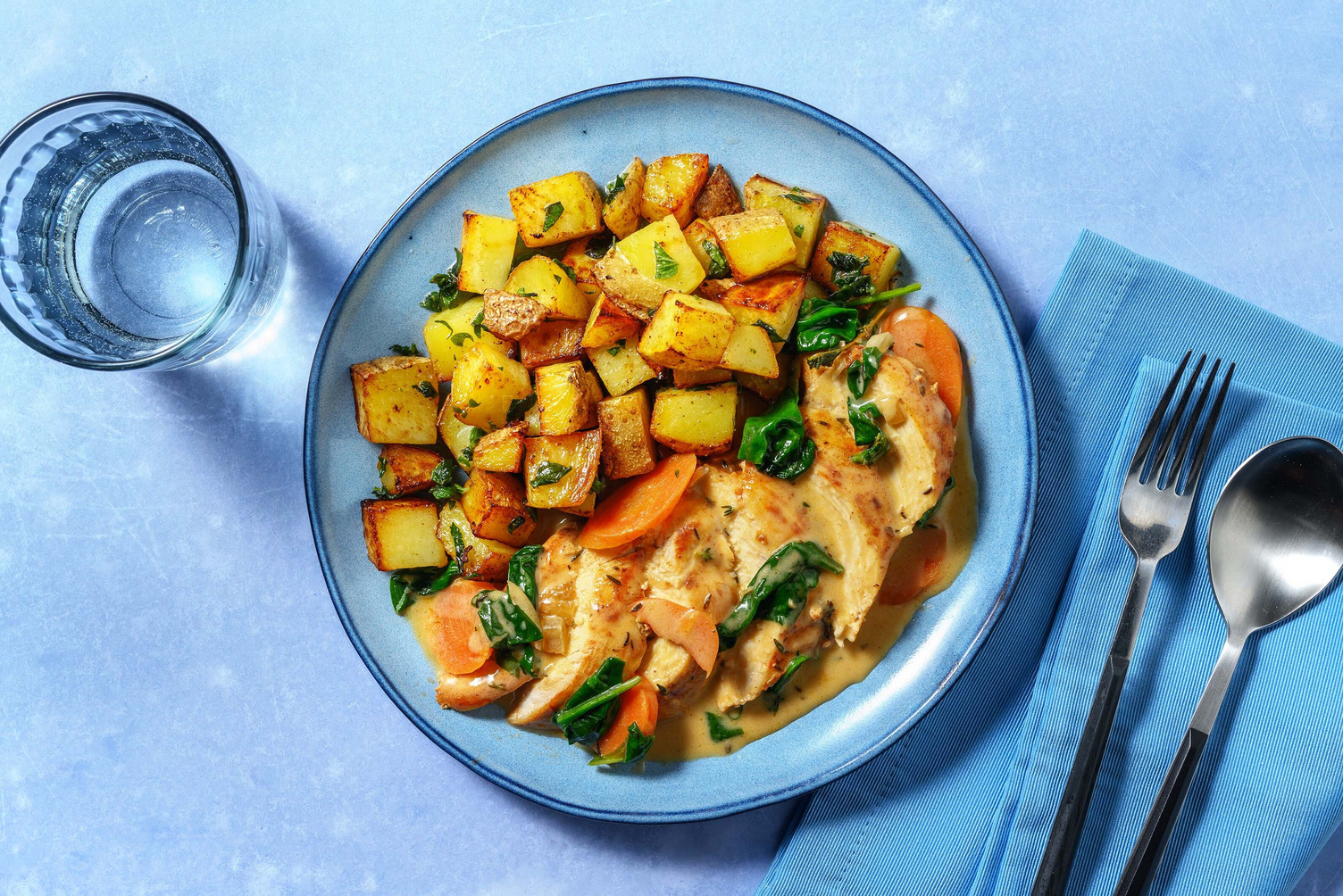 Kipfilet in roomsaus met spinazie en wortel