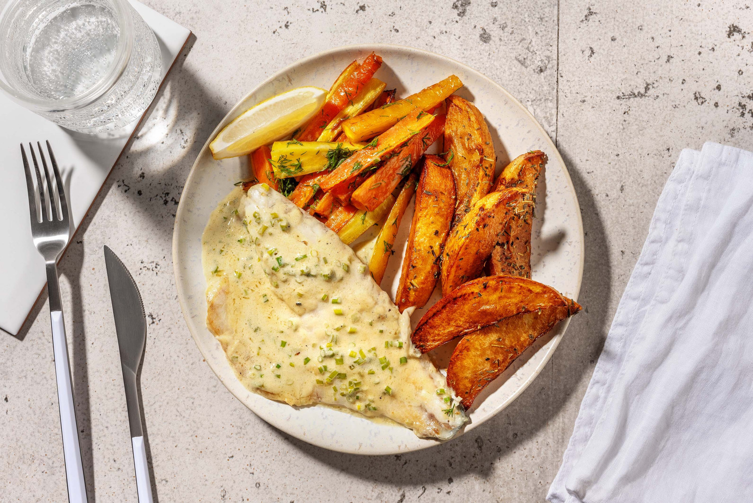 Koolvis met romige bieslooksaus