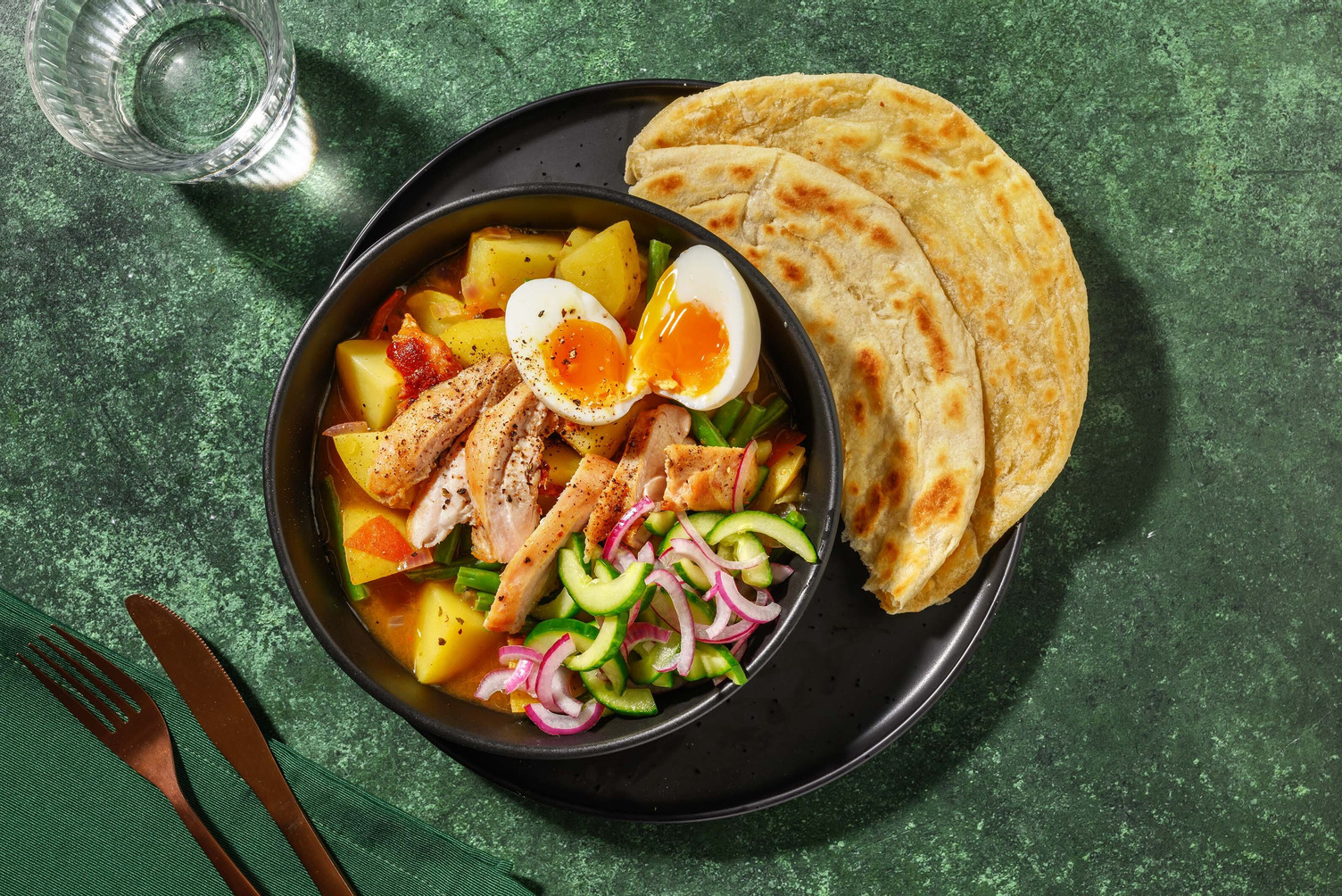 Curry op z'n Surinaams met kip en roti