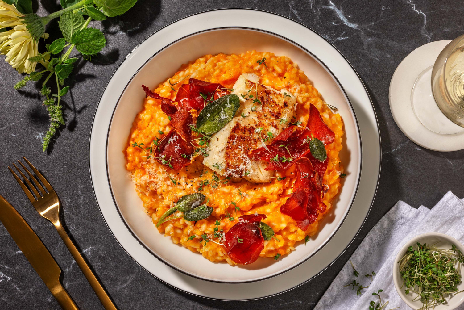 Kabeljauwfilet in salieboter met pompoenrisotto