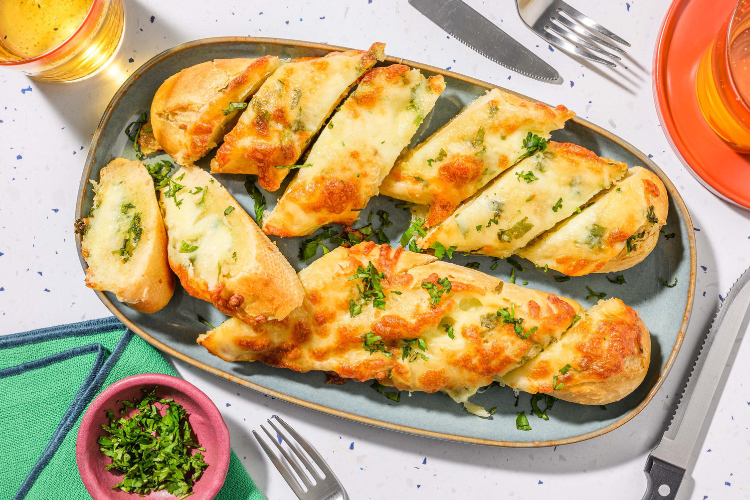 Pain à l’ail et mozzarella en extra