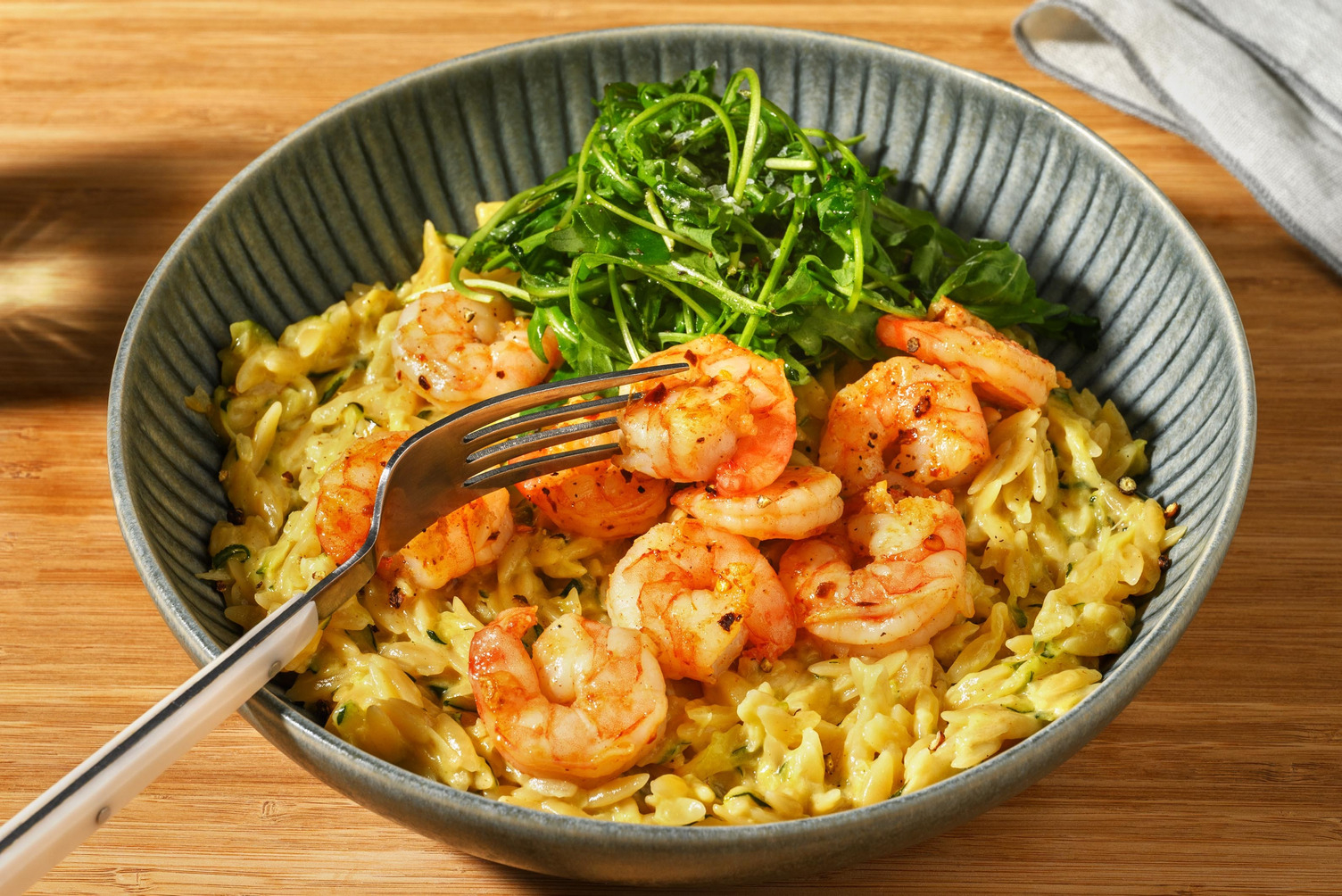 Cremet reje- og citrusorzotto med chorizo