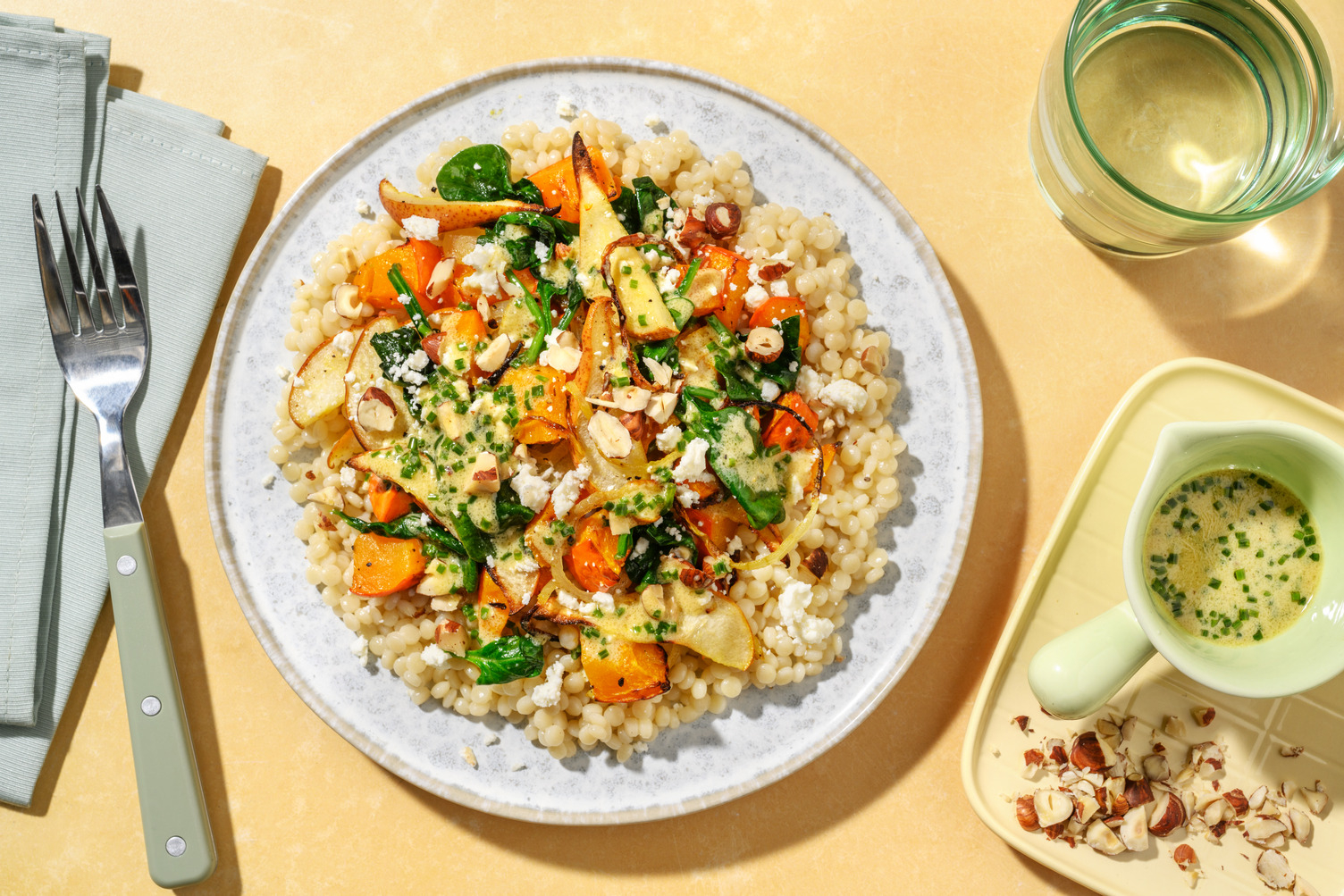 Couscous perlato al formaggio greco e pere