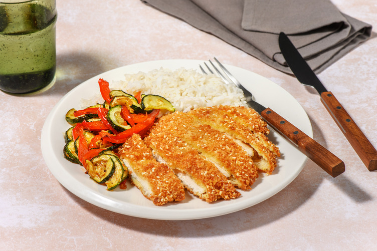 Extra de pollo con costra de sésamo y verduritas a la miel