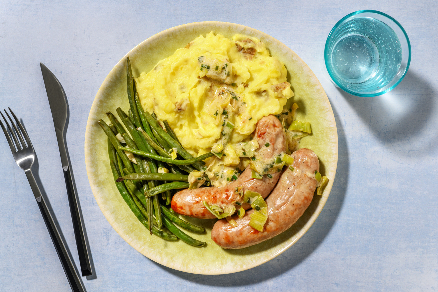 Double Bangers, Mash and Leek & Chive Sauce