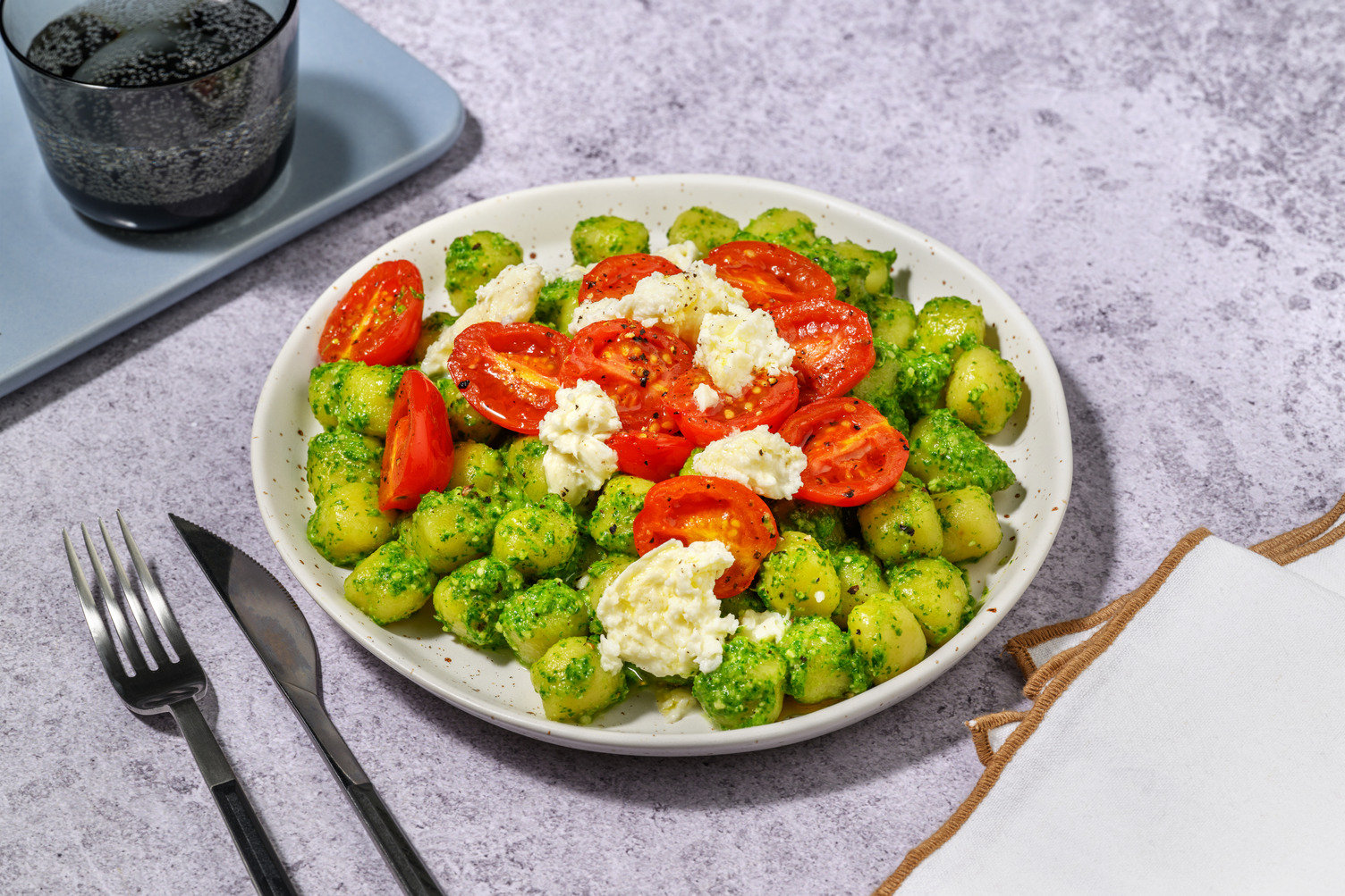 Chicche di patate al pesto di rucola e stracchino