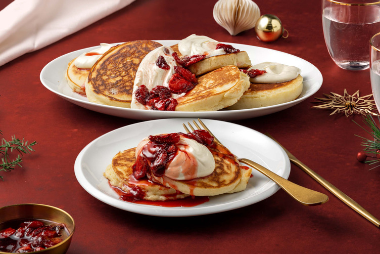 American-style pancakes with strawberry syrup