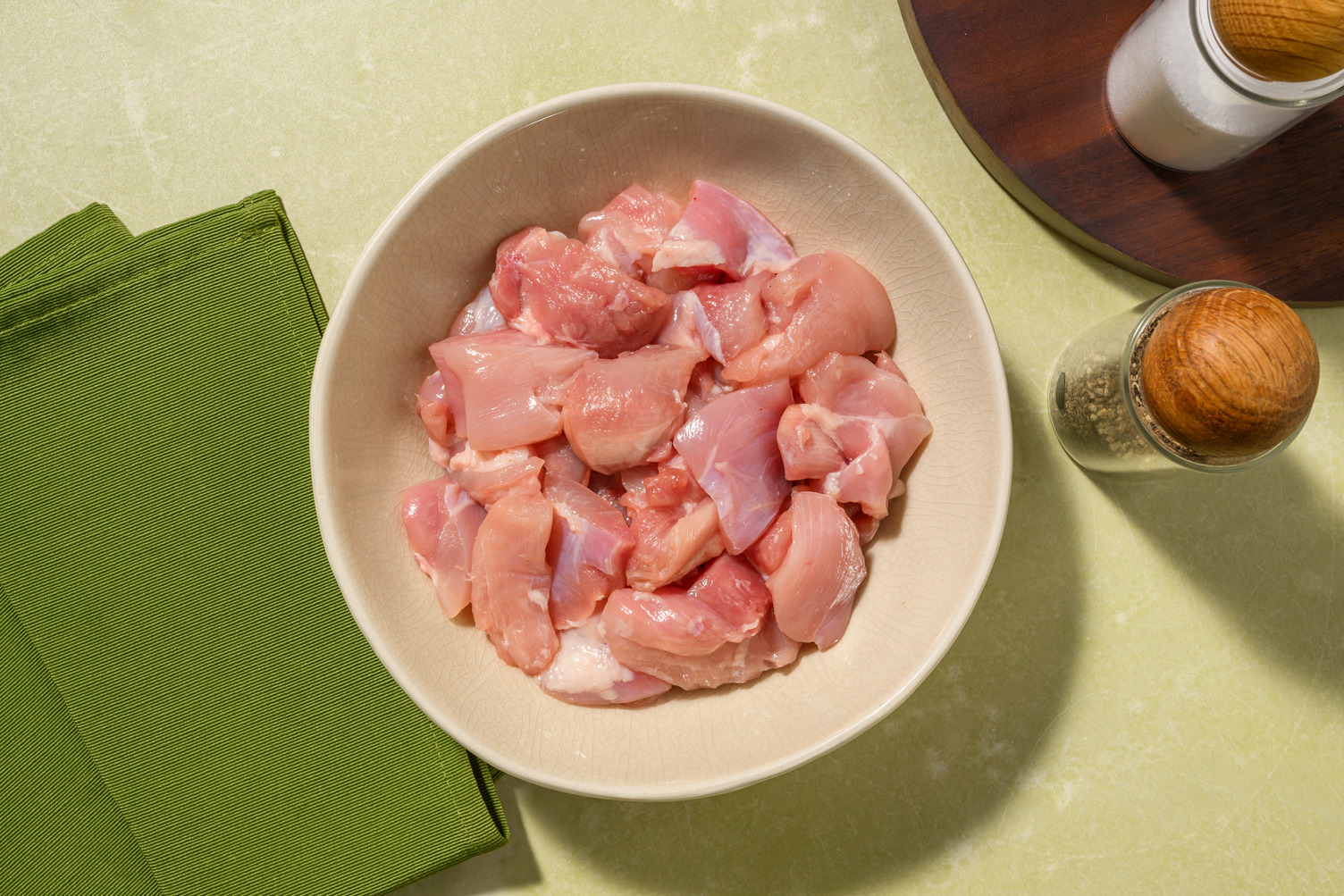 Extra Muslo de pollo troceado