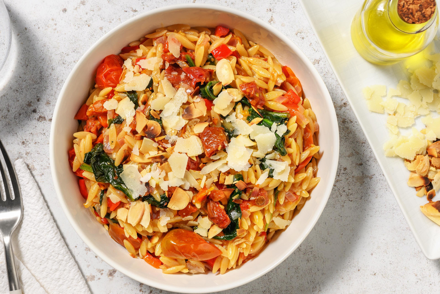 Risotto van orzo met tomaten en Grana Padano