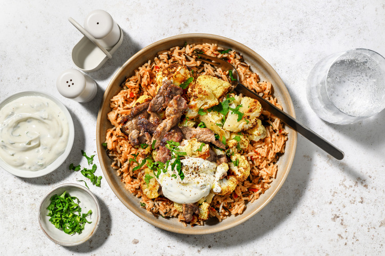 Nigerianischer Jollof-Reis mit extra Bio-Schweinestreifen