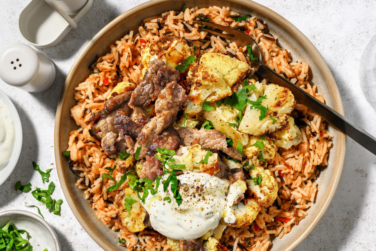 Nigerianischer Jollof-Reis mit extra Bio-Schweinefleisch