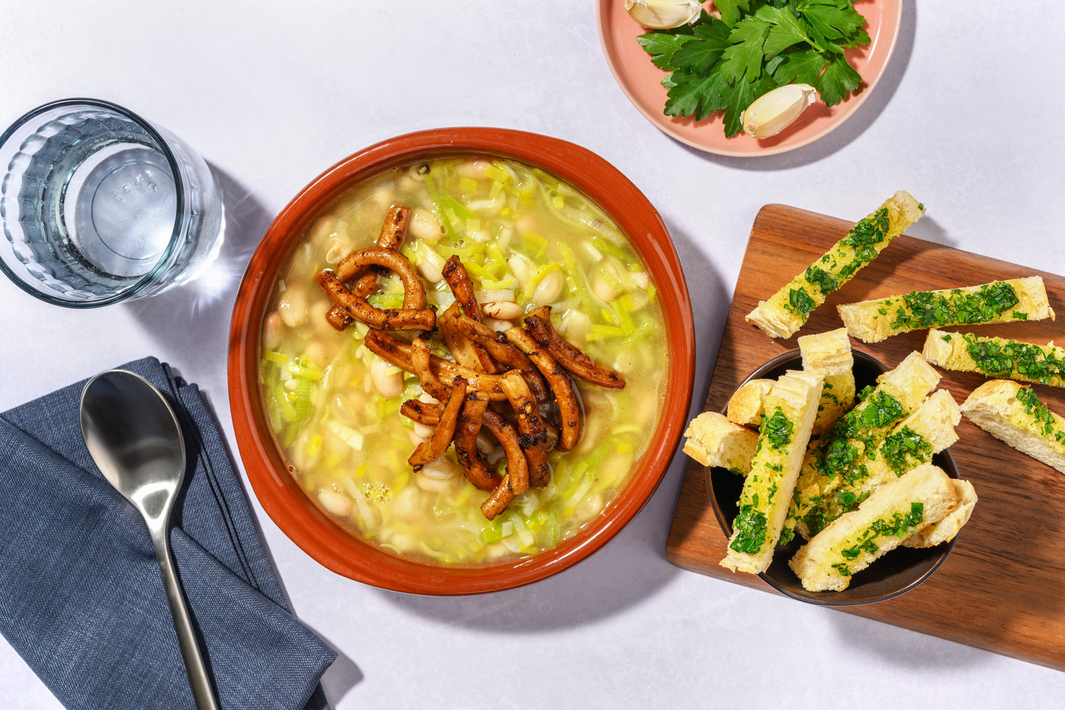 Guiso de judías con calamar gigante caramelizado