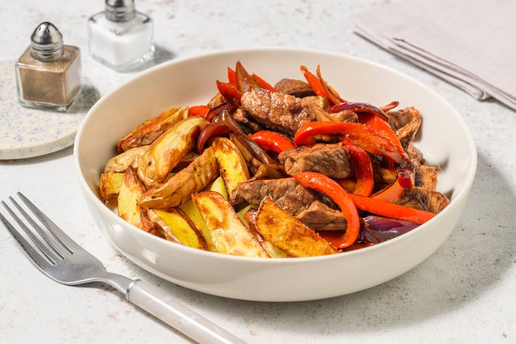 Lomo adobado saltado al estilo peruano