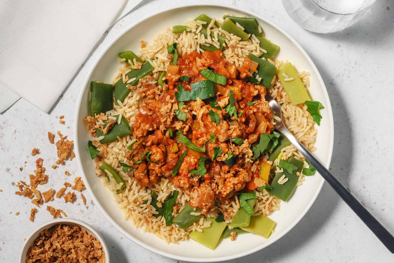 Stoofpotje met varkensboerenworst en Surinaamse kruiden